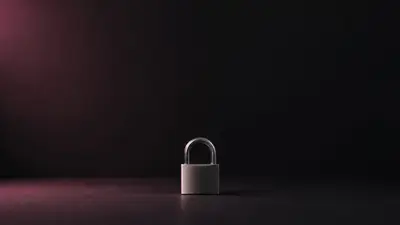 A small brushed-steel padlock on a dark matte surface, lit by a soft rose glow